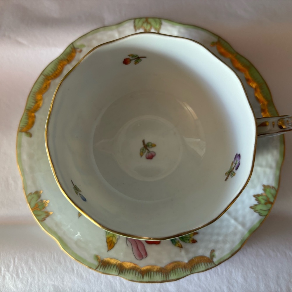 Herend vintage collectible Queen Victoria hand painted teacup and saucer.